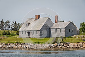 Andrew and Betsy WyethÃÂ¢Ã¢âÂ¬Ã¢âÂ¢s Home on Allen Island on a sunny summer day in Maine photo